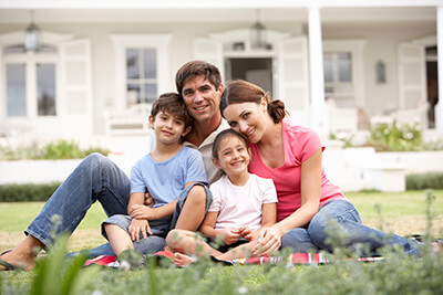 Family outside in the grass