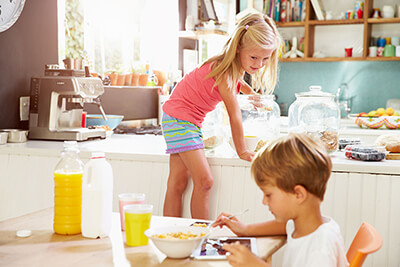 Kids beating the heat in their cooled home