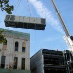 Lifting the HVAC unit to the roof of the Sigal Museum